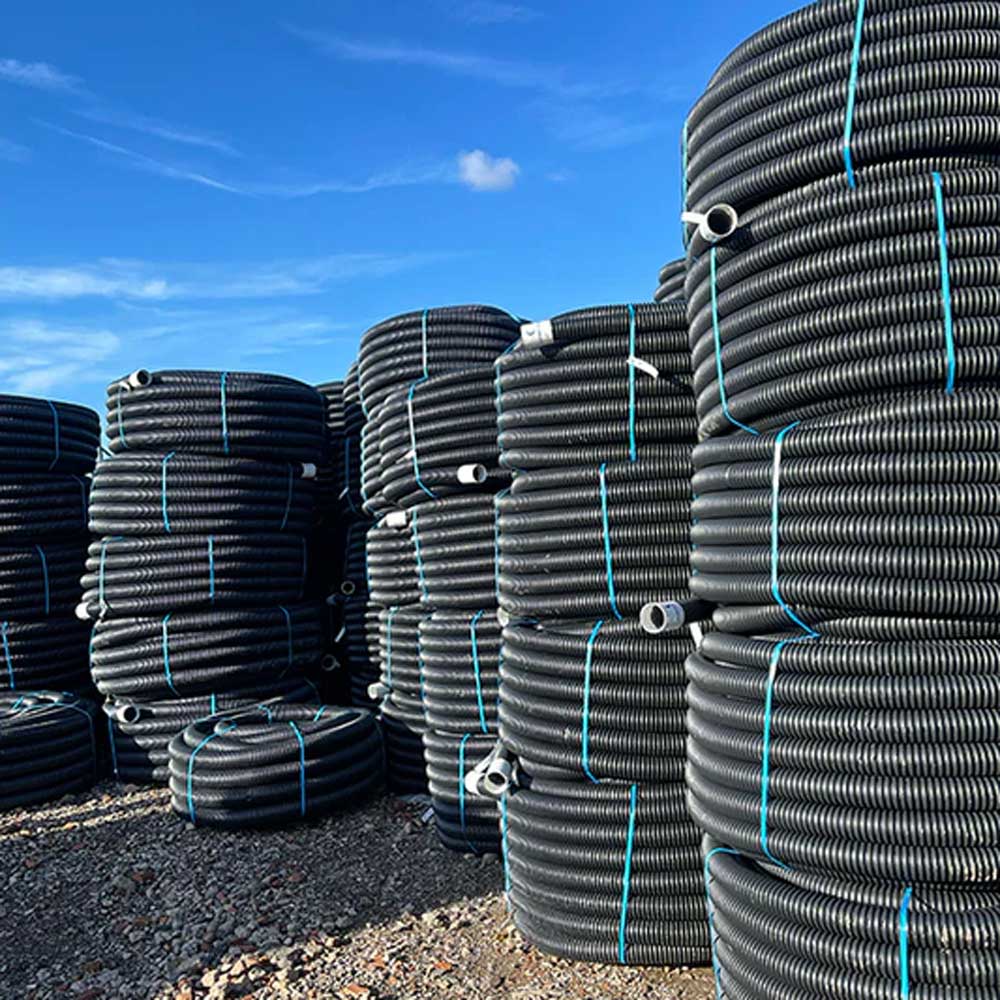 100MM X 25/50/100M COIL PERFORATED LAND DRAIN system - chester UK